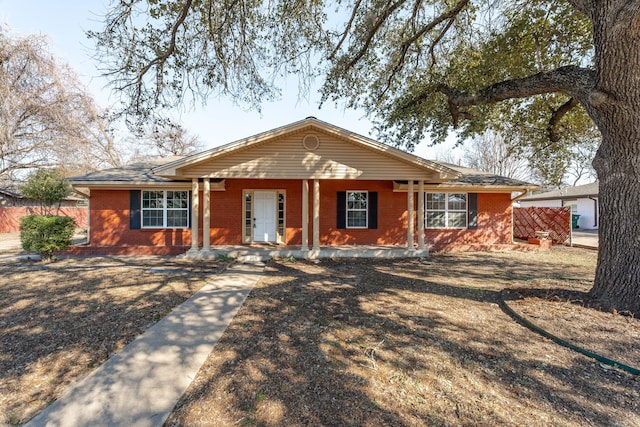 ranch-style house featuring a porch