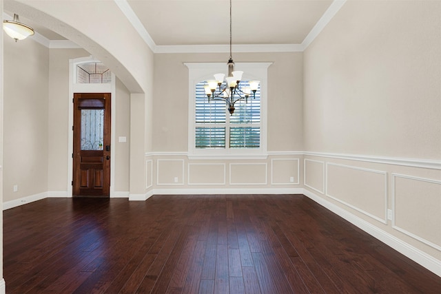 interior space featuring crown molding and dark hardwood / wood-style floors