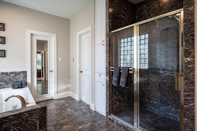 bathroom featuring plus walk in shower