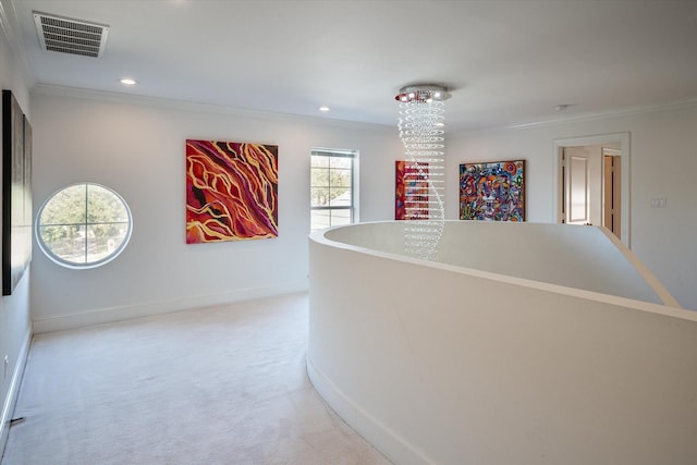 hallway featuring carpet flooring and ornamental molding