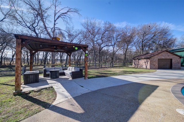 view of community with an outbuilding, a patio area, and outdoor lounge area