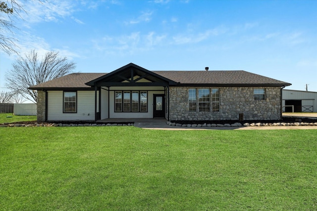 ranch-style house with a front yard