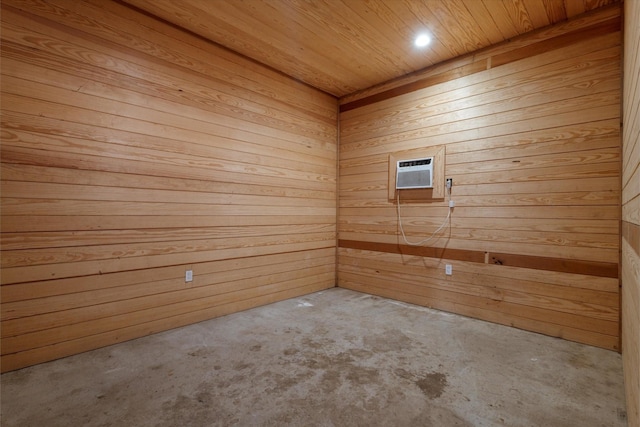 spare room with wooden ceiling and wooden walls