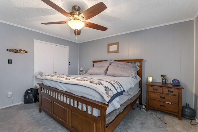 bedroom with ceiling fan, light colored carpet, a closet, and crown molding