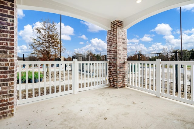 view of patio / terrace with a balcony