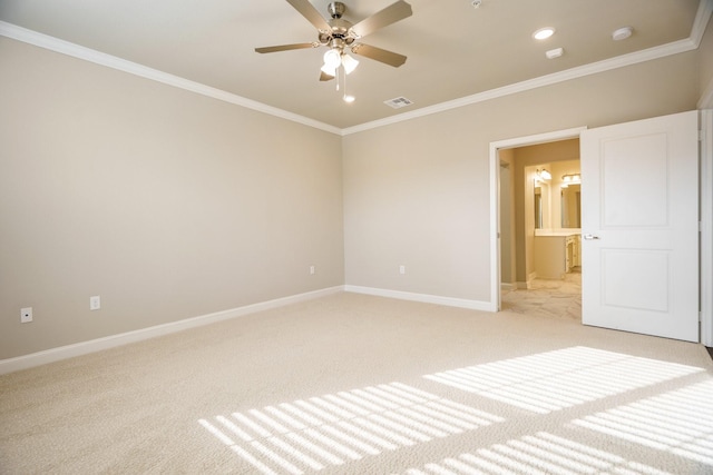 unfurnished bedroom featuring ceiling fan, light colored carpet, ornamental molding, and ensuite bath