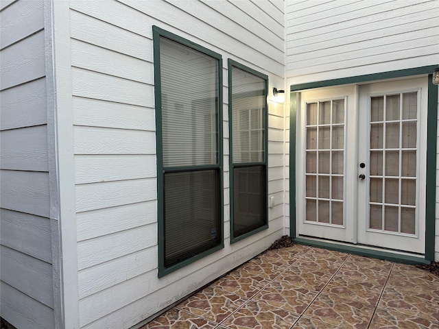 doorway to property with french doors and a patio area