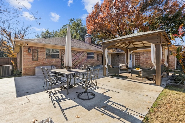 view of patio / terrace featuring a gazebo and an outdoor hangout area