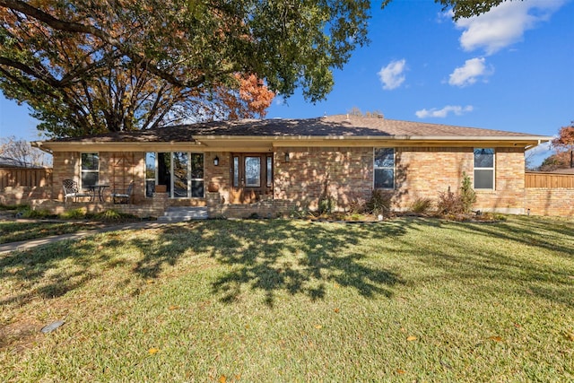 view of front of property with a front lawn