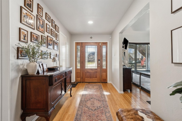 entrance foyer with light hardwood / wood-style flooring