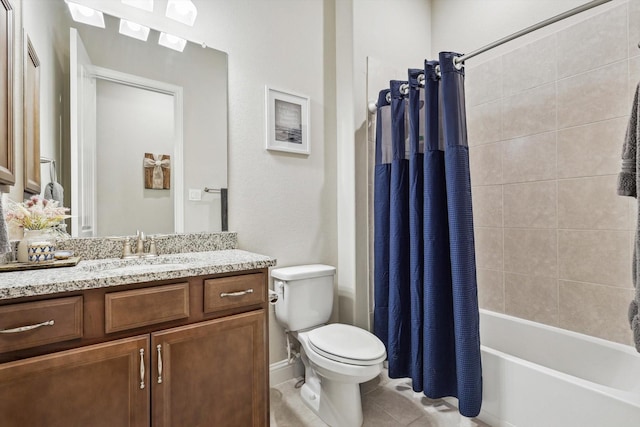 full bathroom featuring tile patterned floors, toilet, vanity, and shower / bath combination with curtain