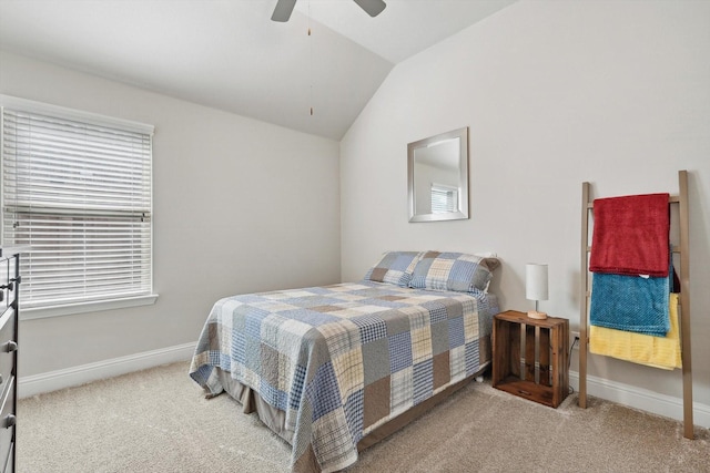 carpeted bedroom featuring vaulted ceiling and ceiling fan