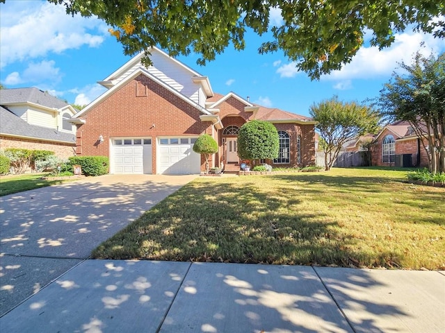 view of front property featuring a garage and a front yard