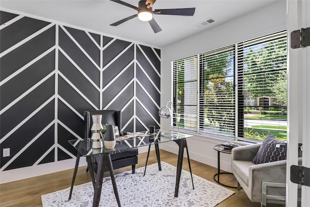 office area with hardwood / wood-style flooring and ceiling fan