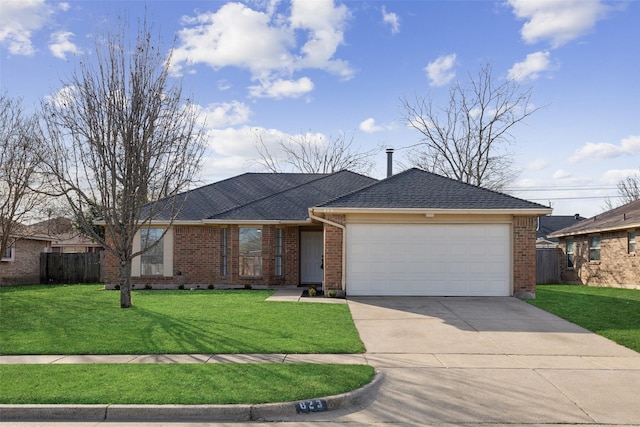 ranch-style home with a garage and a front lawn