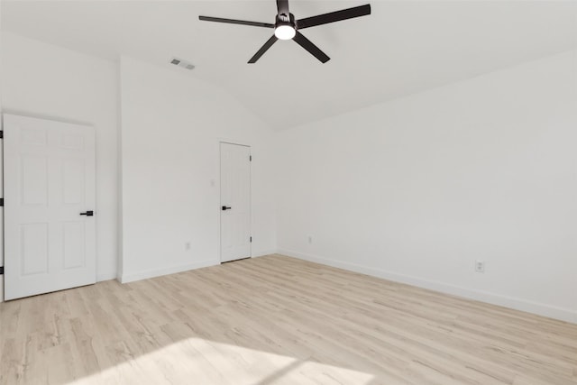 unfurnished room with ceiling fan, vaulted ceiling, and light hardwood / wood-style floors