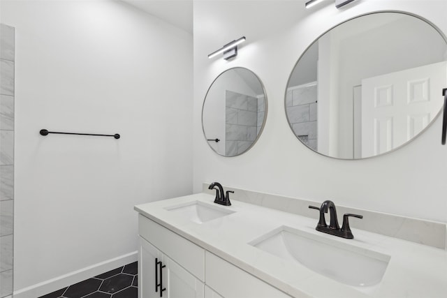 bathroom featuring vanity and tile patterned flooring