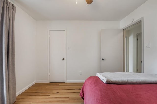 bedroom featuring ceiling fan and light hardwood / wood-style floors