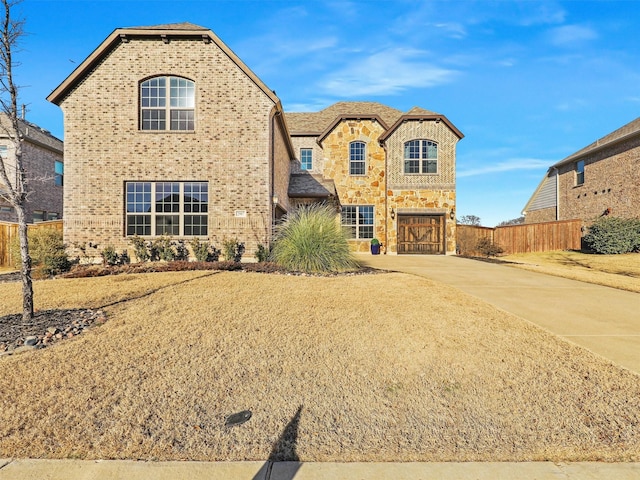 front of property with a garage