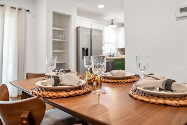 dining area featuring recessed lighting