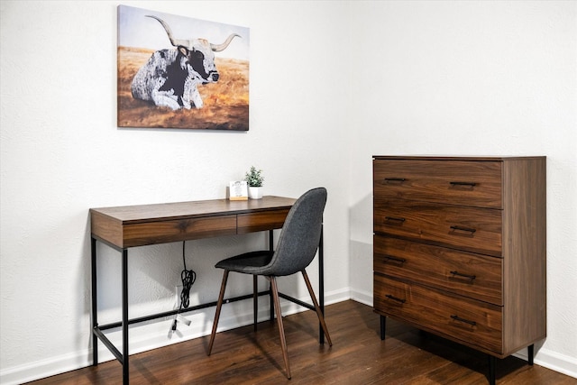 office area featuring baseboards and wood finished floors