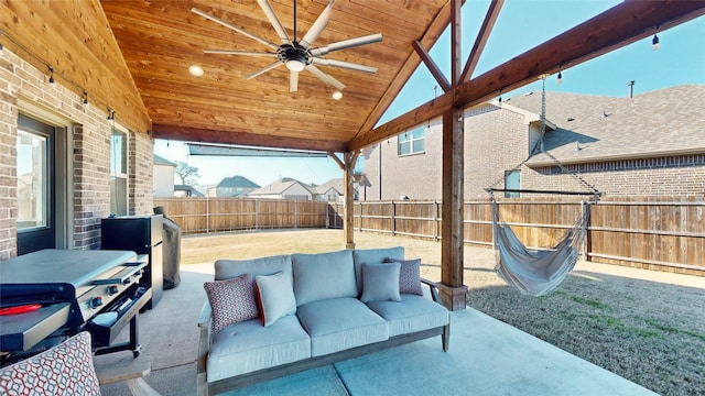 view of patio / terrace with ceiling fan and an outdoor living space