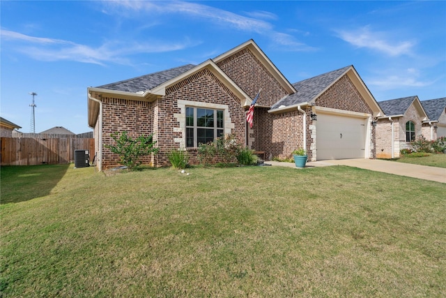 single story home with a garage and a front yard