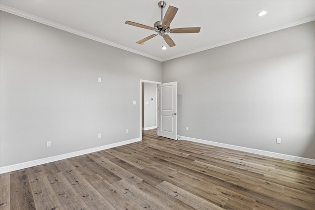 unfurnished room with hardwood / wood-style flooring, ornamental molding, and ceiling fan