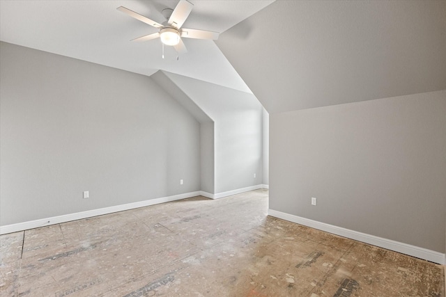 additional living space featuring ceiling fan and lofted ceiling