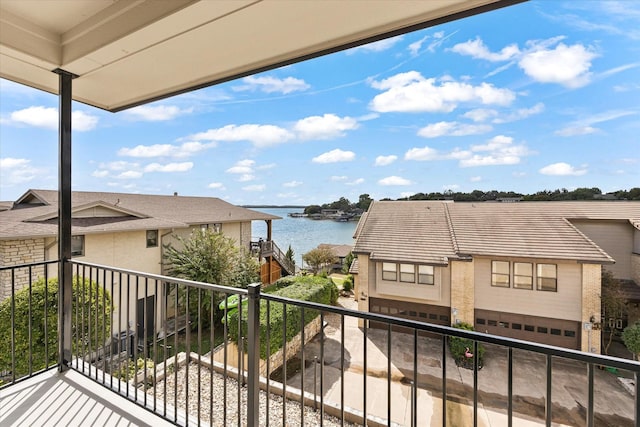 balcony featuring a water view