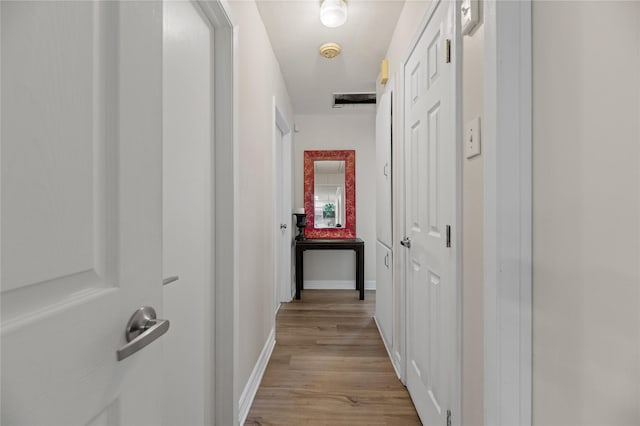 corridor featuring light wood-type flooring