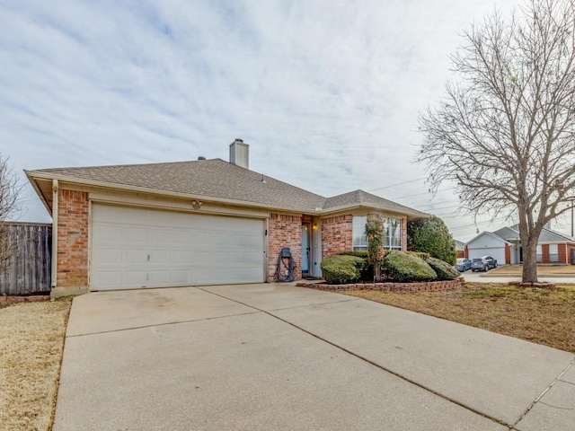 single story home featuring a garage