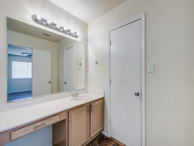 bathroom featuring vanity and tile patterned flooring