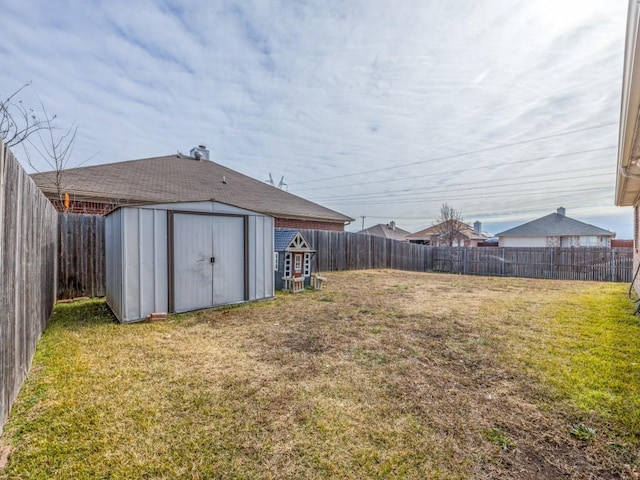 view of yard with a storage shed