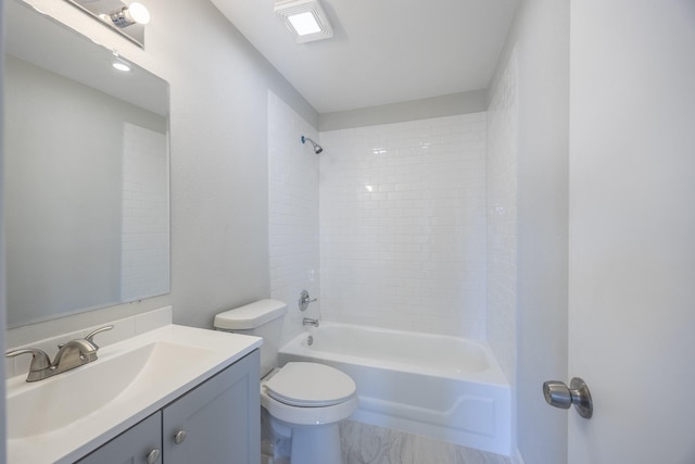 full bathroom with toilet, vanity, and  shower combination