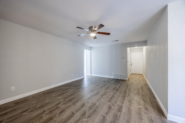 spare room with light hardwood / wood-style floors and ceiling fan