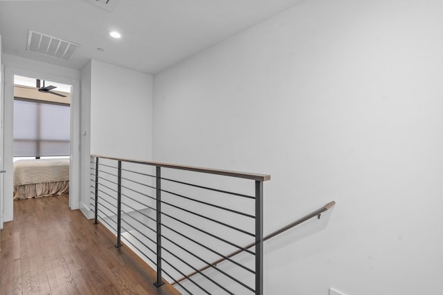 corridor with dark wood-type flooring