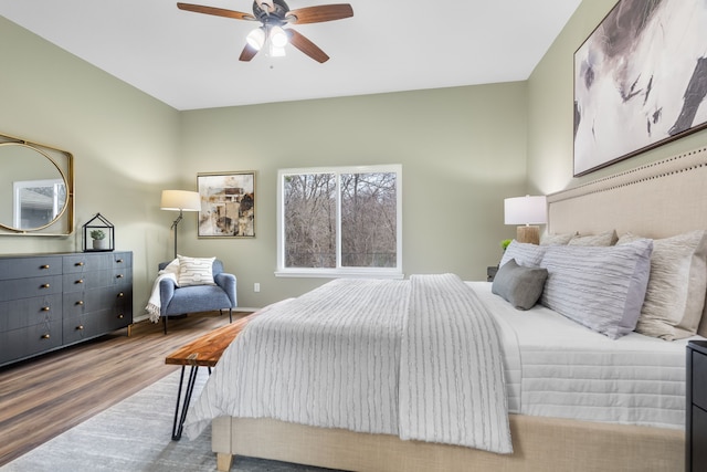 bedroom featuring ceiling fan and hardwood / wood-style floors