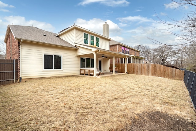 back of property with a patio and ceiling fan