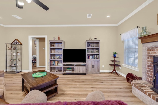 living room with ceiling fan, light hardwood / wood-style flooring, and ornamental molding