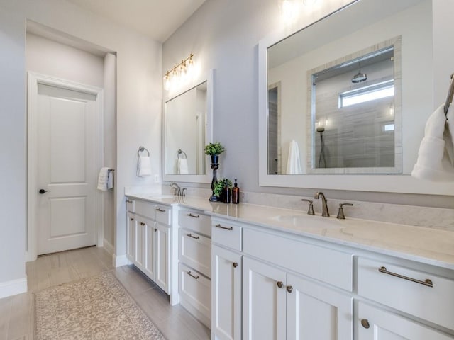 bathroom with vanity and walk in shower