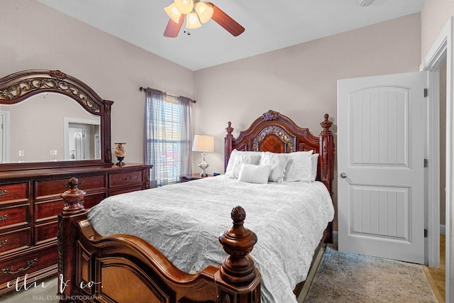 carpeted bedroom featuring ceiling fan