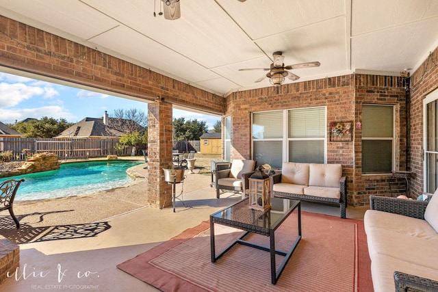 exterior space featuring ceiling fan, a patio area, and an outdoor hangout area