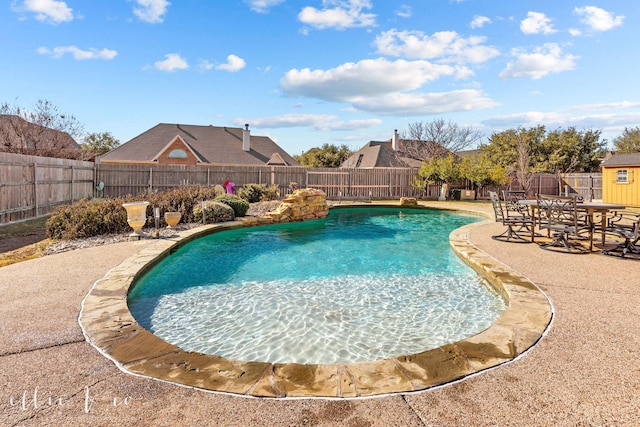 view of pool featuring a patio area