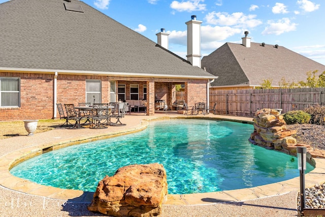 view of pool featuring a patio area