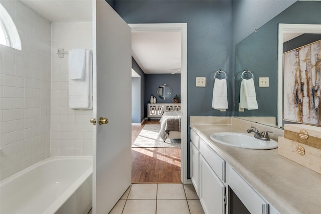 bathroom with tile patterned floors and vanity