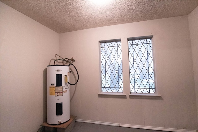 utility room featuring water heater