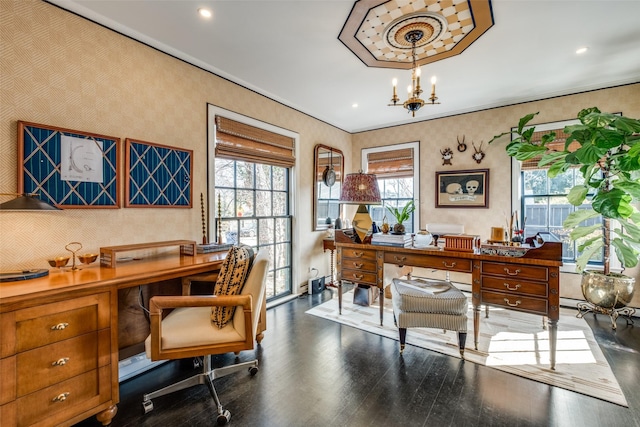 home office with dark hardwood / wood-style floors, crown molding, and a chandelier