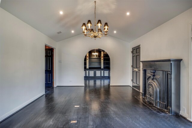 unfurnished living room featuring a chandelier, lofted ceiling, dark wood-style flooring, visible vents, and baseboards