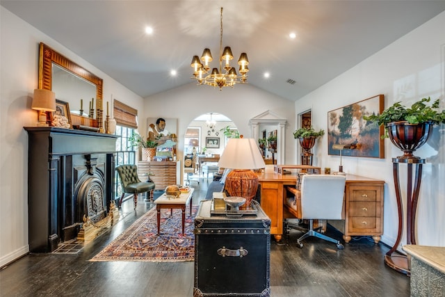 office with dark hardwood / wood-style floors, vaulted ceiling, and a notable chandelier